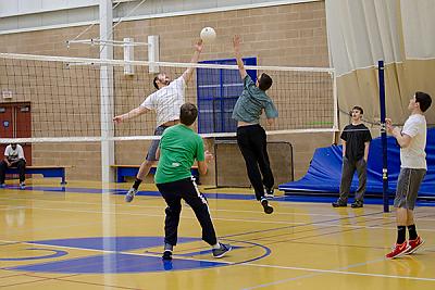 Landmark College students playing volleyball in the Click Center.